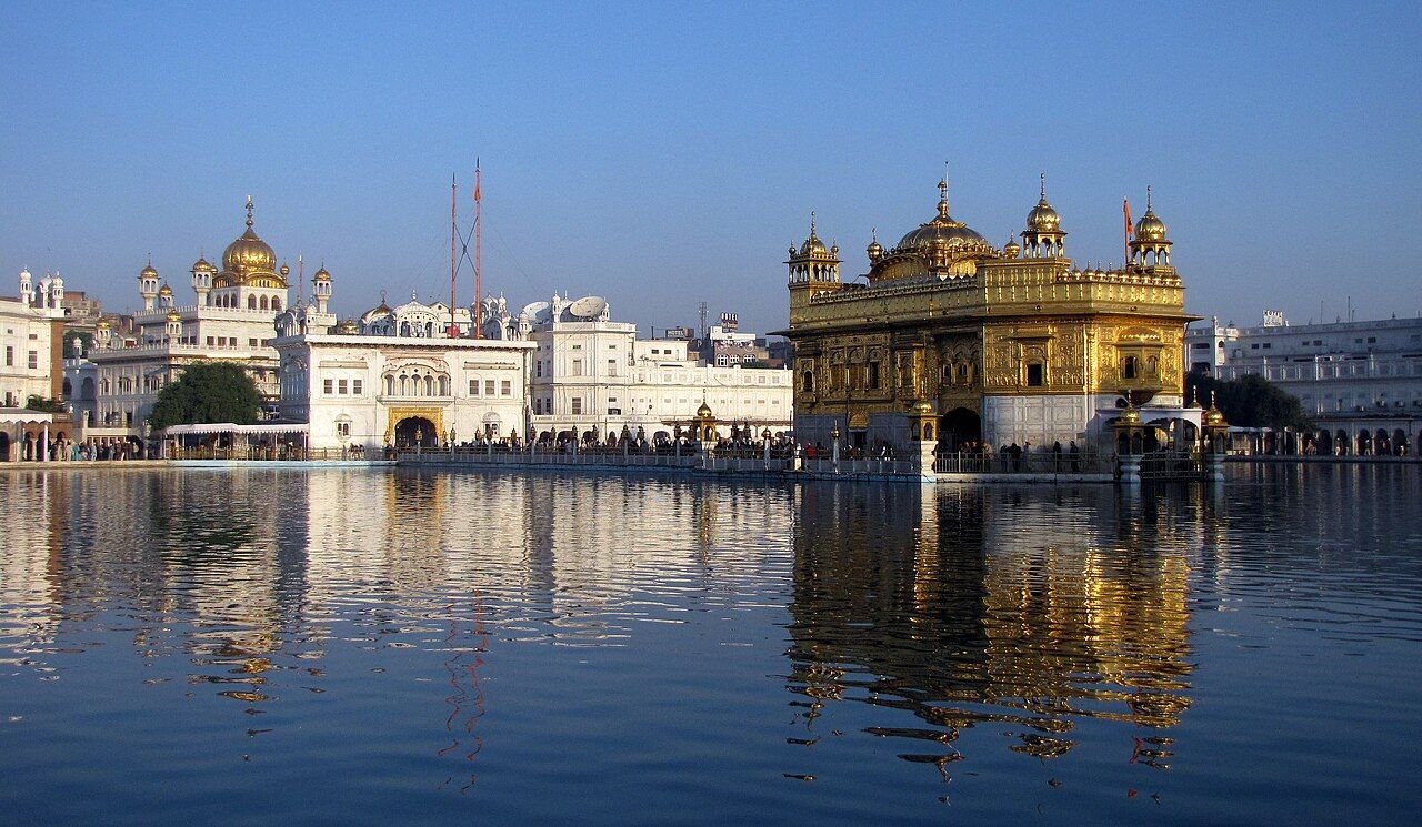 The Akal Takht and Harmandir Sahib seen together at the Golden Temple complex in Amritsar