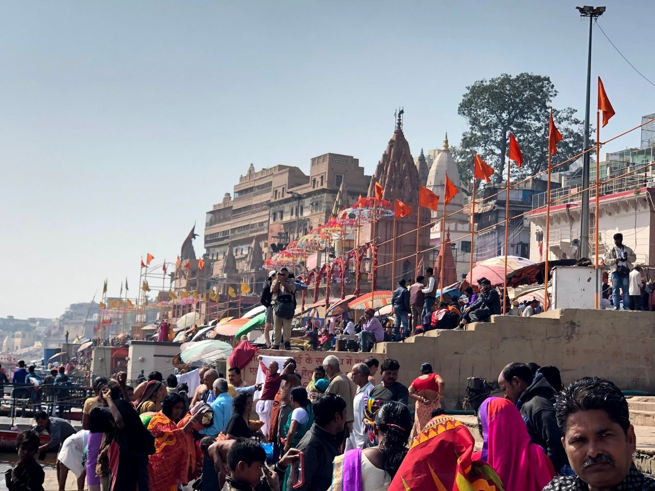 Dashashwamedh Ghat on the Ganga in Varanasi with boats and pilgrims on the steps