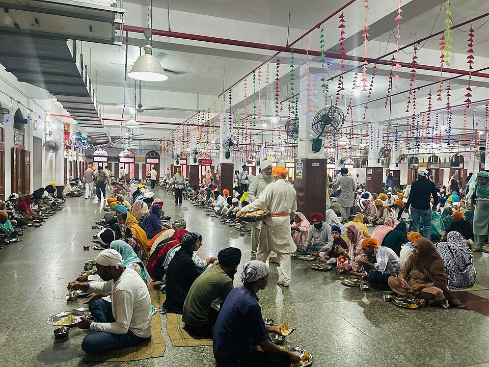 Volunteers and visitors at the langar community kitchen of the Golden Temple in Amritsar