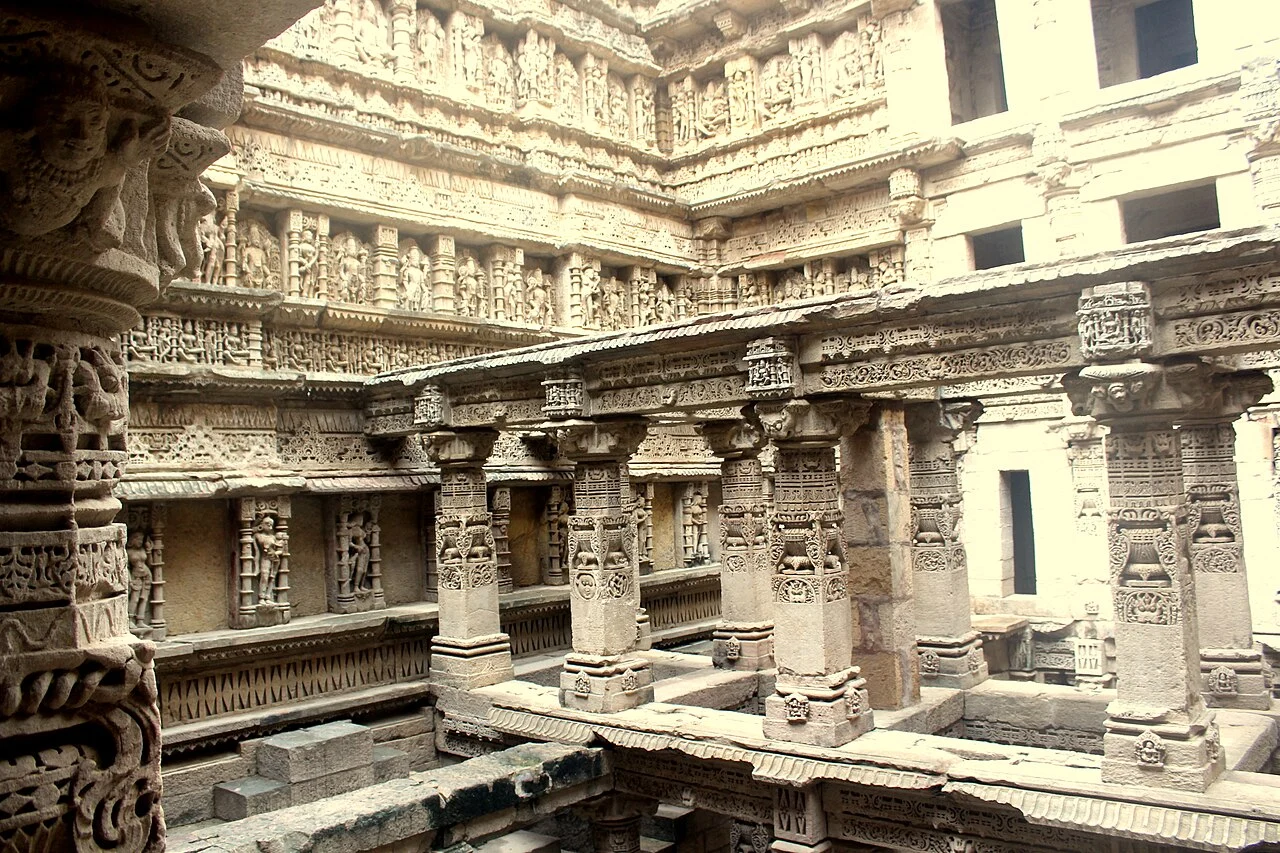 Inside Rani ki Vav in Patan, Gujarat, showing carved pillars and tiered galleries of the stepwell